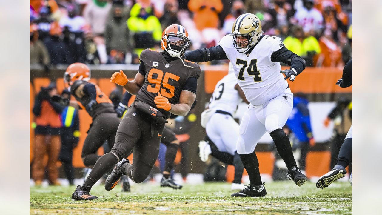 FILE - New Orleans Saints tight end Juwan Johnson (83) attempts to block Cleveland  Browns defensive end Myles Garrett (95) during an NFL football game,  Saturday, Dec. 24, 2022, in Cleveland. As