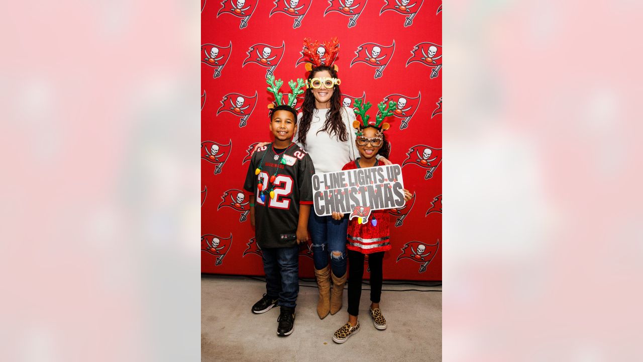 Bucs D-Line delivers special Christmas for kids