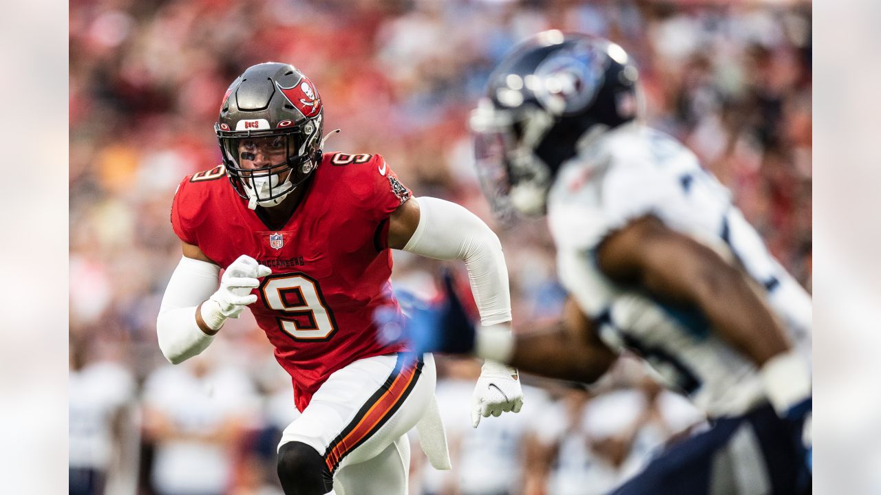 Tampa Bay Buccaneers linebacker Joe Tryon-Shoyinka (9) stretches out prior  to an NFL football game against the New England Patriots, Sunday, Oct. 3,  2021, in Foxborough, Mass. (AP Photo/Greg M. Cooper Stock