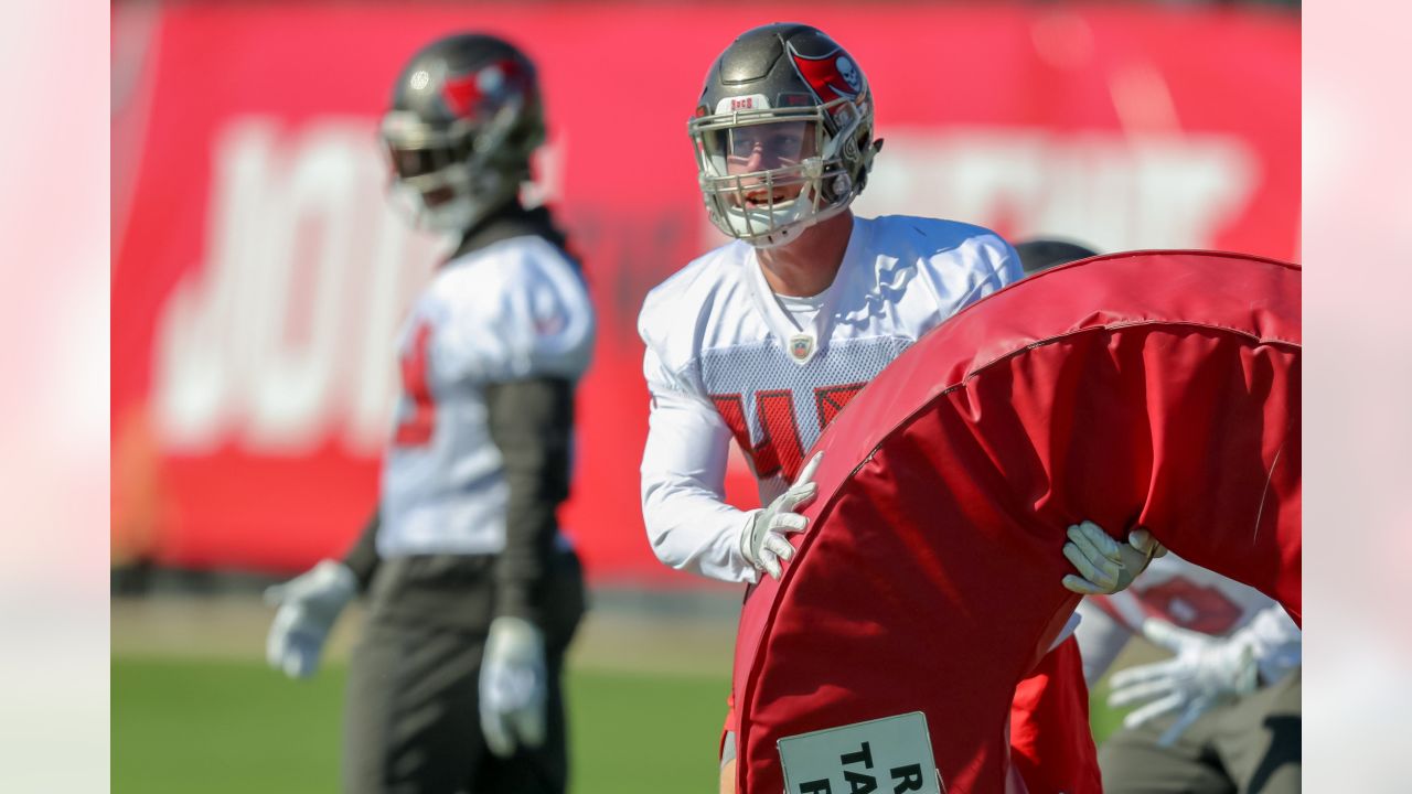 Tampa Bay Buccaneers guard Alex Cappa (65) reacts to the snap during a NFL  divisional playoff f …