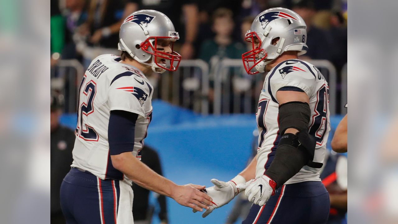 New England Patriots quarterback Tom Brady (12) and tight end Rob  Gronkowski (87) celebrate a touchdown, during the second half of the NFL  Super Bowl 52 football game against the Philadelphia Eagl …