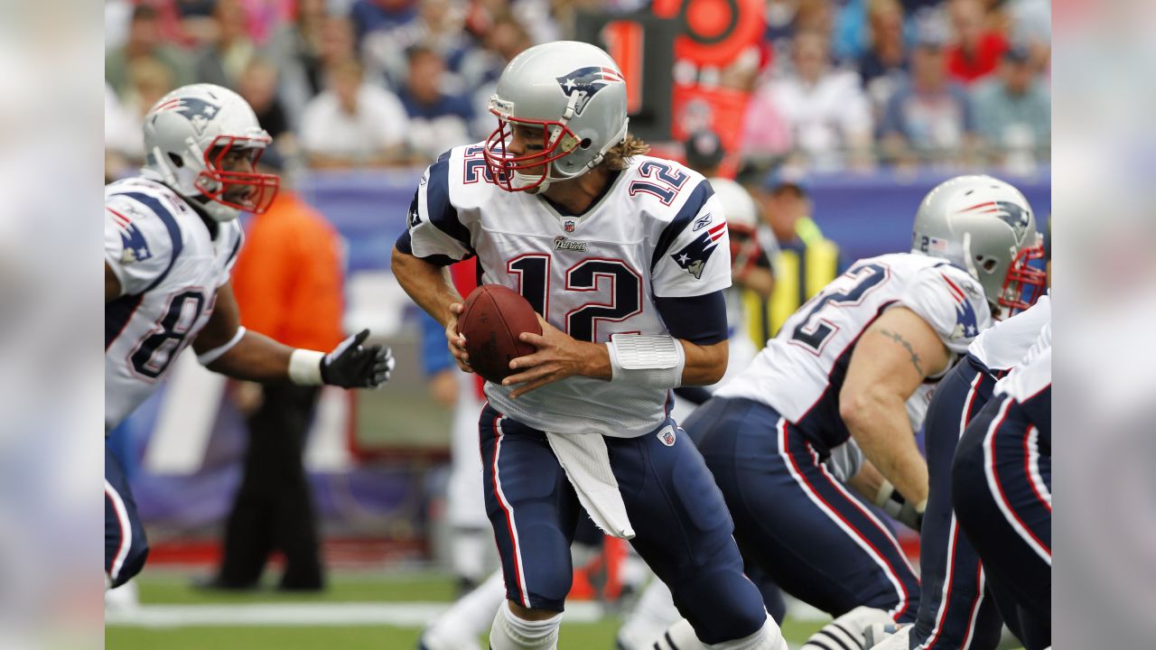 29 August 2012 - East Rutherford, New Jersey - New England Patriots  quarterback Tom Brady (12) looks on with his helmet off during the NFL  preseason game between the New England Patriots