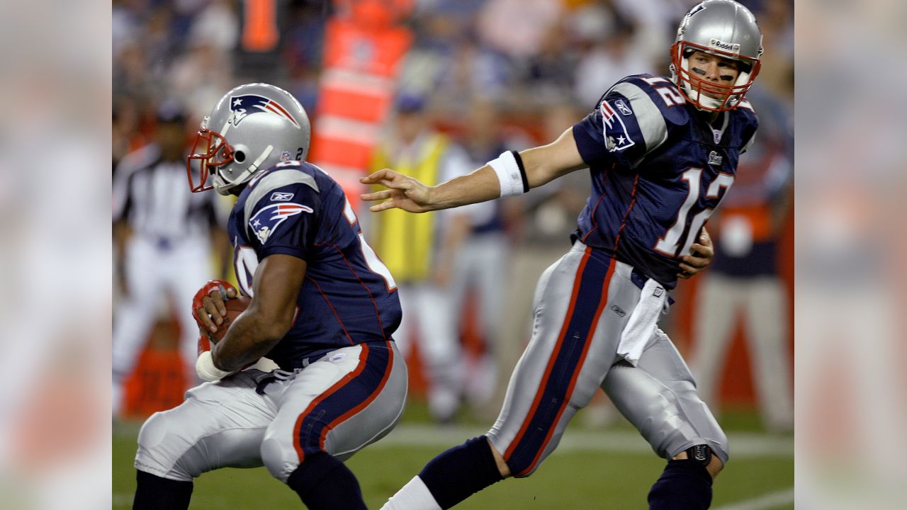 29 August 2012 - East Rutherford, New Jersey - New England Patriots  quarterback Tom Brady (12) looks on with his helmet off during the NFL  preseason game between the New England Patriots