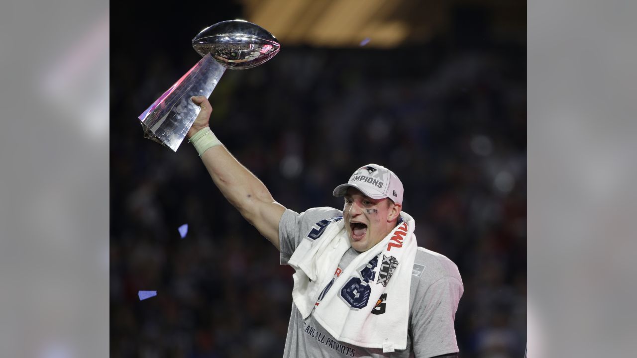 New England Patriots tight end Ron Gronkowski arrives on the field for  media day prior to Super Bowl XLVI in Indianapolis on January 31, 2012.  This is Gronkowski's first day without wearing