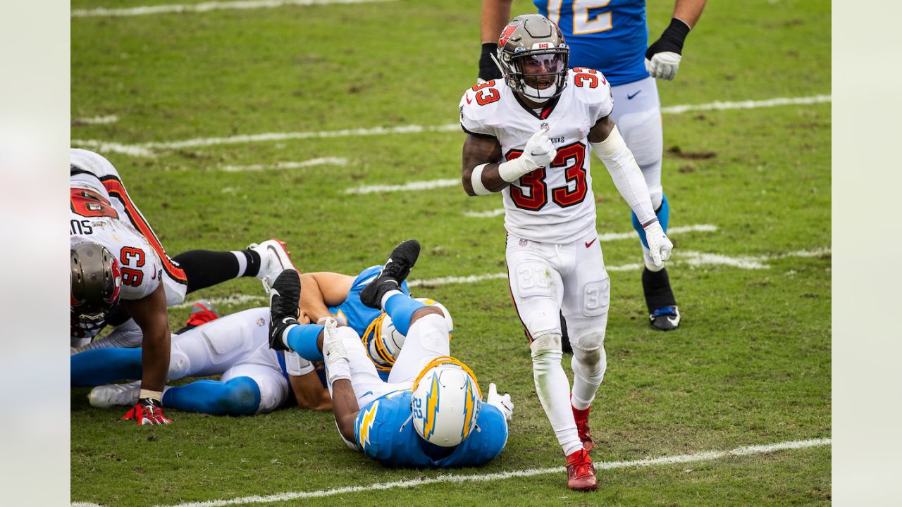 TAMPA, FL - OCTOBER 04: Jordan Whitehead (33) and Devin White (45) of the  Buccaneers celebrates a defensive stop during the regular season game  between the Los Angeles Chargers and the Tampa