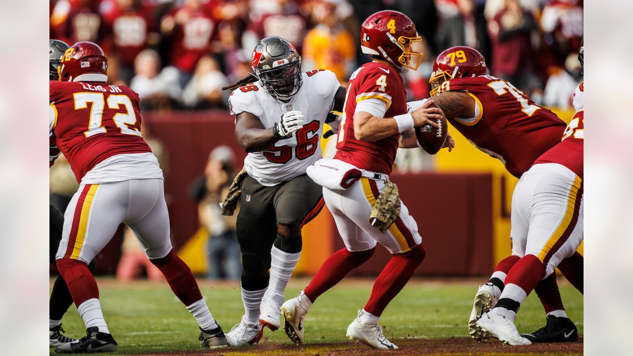 Tampa Bay Buccaneers defensive tackle Vita Vea (50) looks on between plays  during the second half of an NFL football game against the Washington  Football Team, Sunday, Nov. 14, 2021, in Landover