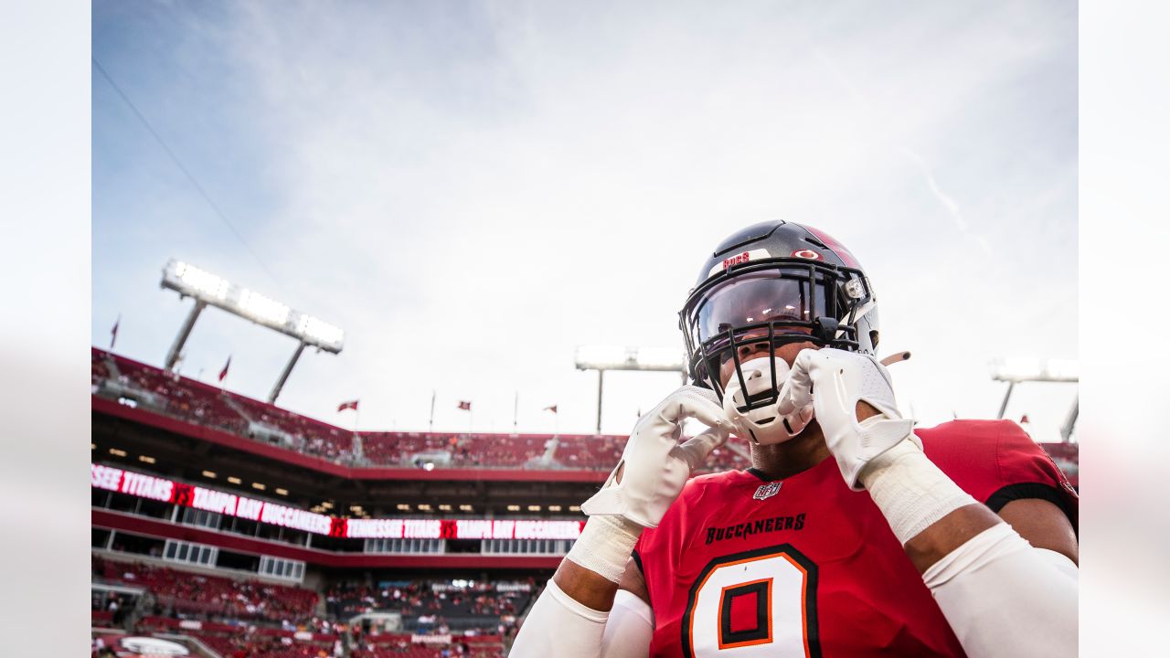 Tampa Bay Buccaneers linebacker Joe Tryon-Shoyinka (9) stretches out prior  to an NFL football game against the New England Patriots, Sunday, Oct. 3,  2021, in Foxborough, Mass. (AP Photo/Greg M. Cooper Stock