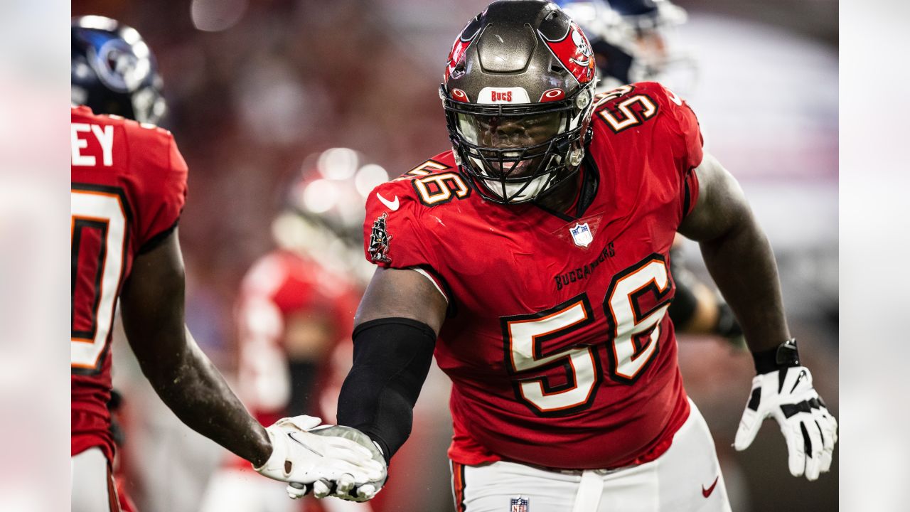 Tampa Bay Buccaneers linebacker Joe Tryon-Shoyinka (9) stretches out prior  to an NFL football game against the New England Patriots, Sunday, Oct. 3,  2021, in Foxborough, Mass. (AP Photo/Greg M. Cooper Stock