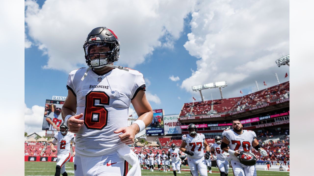 Chicago Bears defensive tackle Justin Jones (93) is held back by Tampa Bay  Buccaneers guard Cody Mauch (69) as Jones tries to stop a pass by Tampa Bay  Buccaneers quarterback Baker Mayfield (