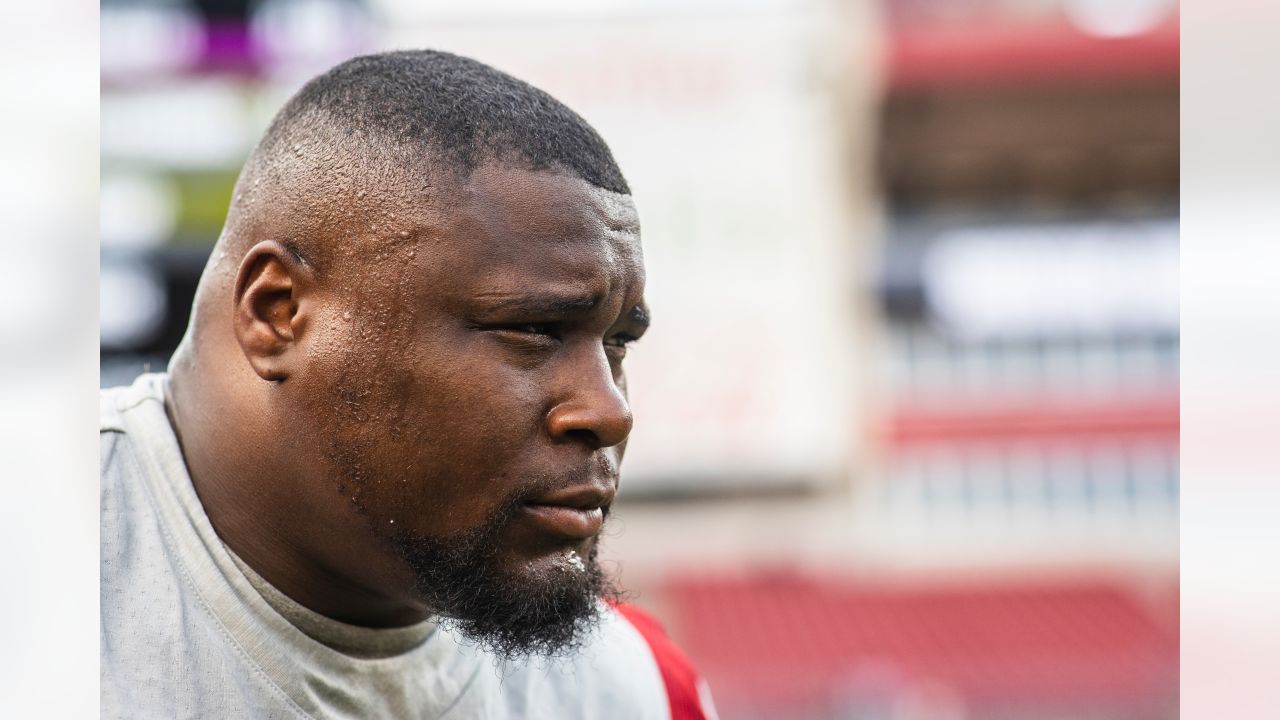 Tampa Bay Buccaneers linebacker Joe Tryon-Shoyinka (9) stretches out prior  to an NFL football game against the New England Patriots, Sunday, Oct. 3,  2021, in Foxborough, Mass. (AP Photo/Greg M. Cooper Stock