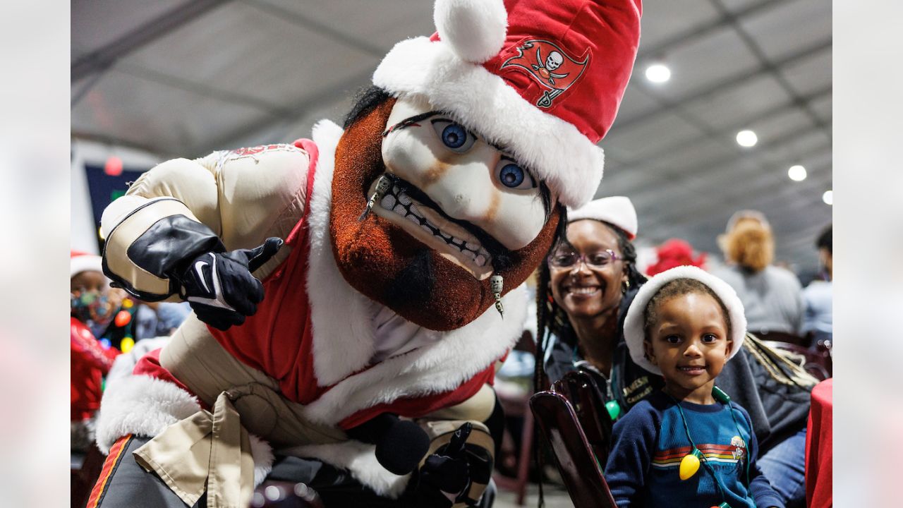 Bucs D-Line delivers special Christmas for kids