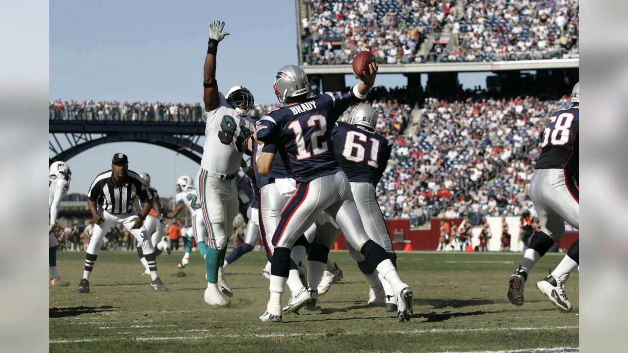 New England Patriots fans hold a sign for the 72' Dolphin team during the  game between the Dolphins and New England Patriots at Gillette Stadium in  Foxboro, Massachusetts, Sunday, December 23, 2007.