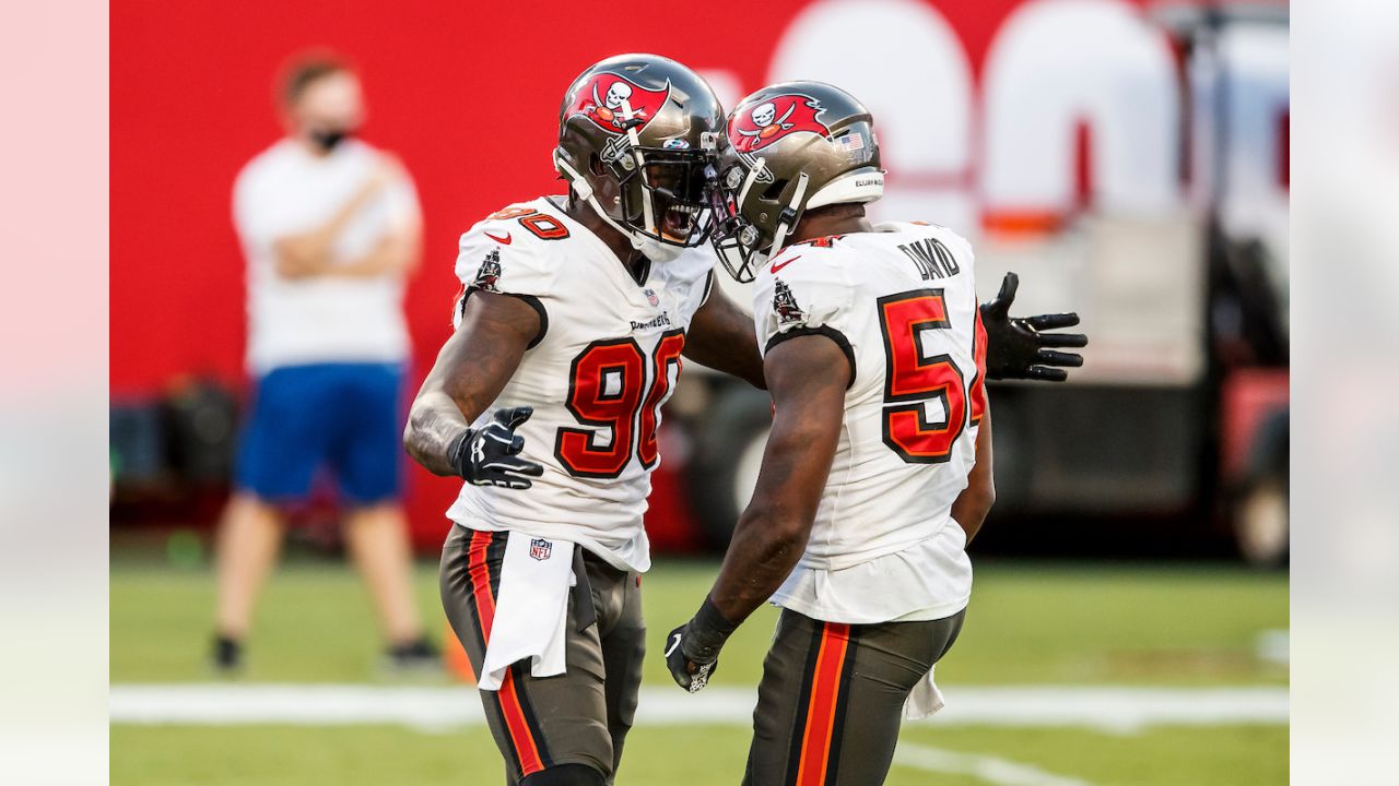 Tampa Bay Buccaneers outside linebacker Jason Pierre-Paul (90) and inside  linebacker Lavonte David (54) celebrate after sacking Green Bay Packers  quarterback Aaron Rodgers (12) during the second half of an NFL football