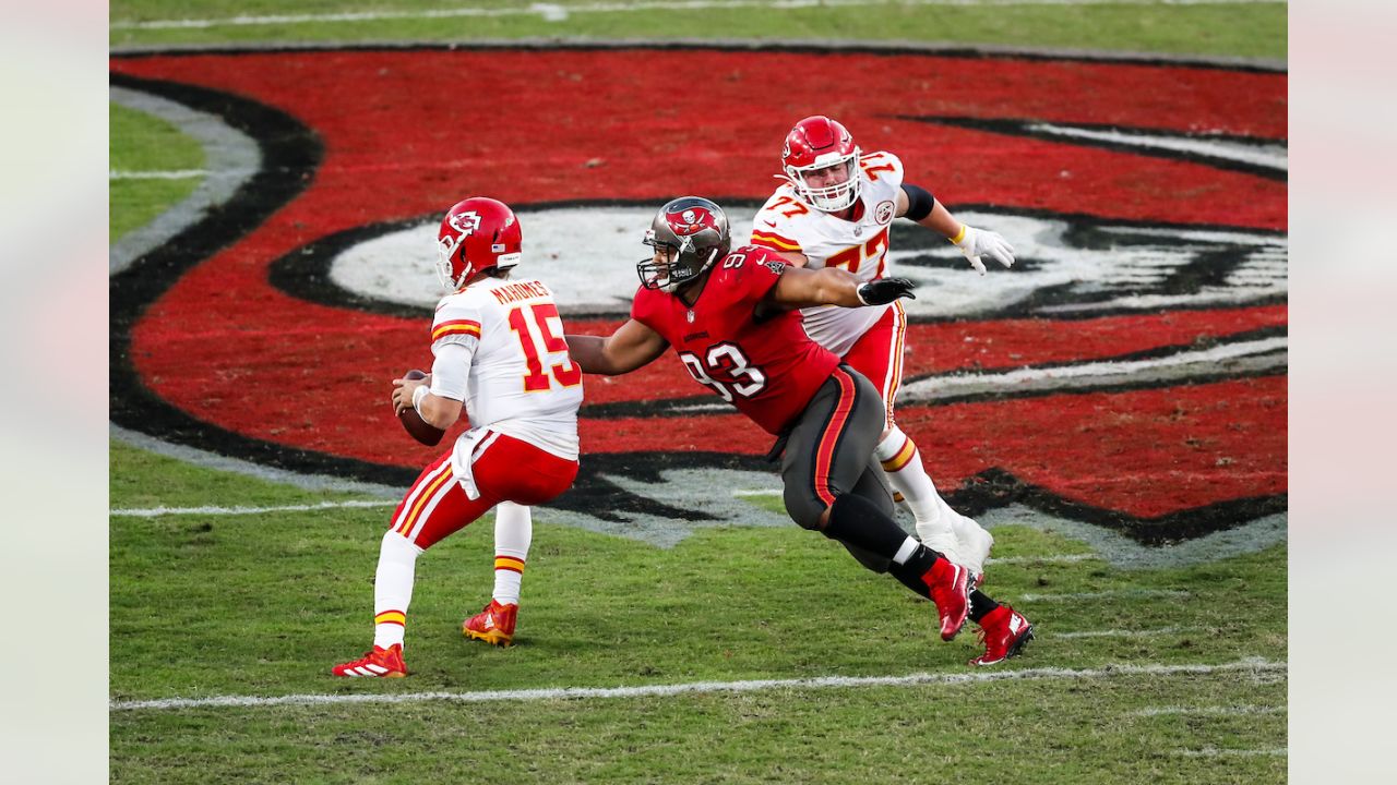 Tampa, United States. 29th Nov, 2020. Tampa Bay Buccaneers quarterback Tom  Brady (12) is hit by Kansas City Chiefs' Frank Clark (C) during the fourth  quarter at Raymond James Stadium in Tampa