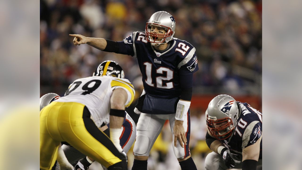 New England Patriots quarterback Tom Brady calls a play at the line of  scrimmage against the Tampa Bay Buccaneers during their football game  Sunday, Dec. 18, 2005, in Foxborough, Mass. Brady leads