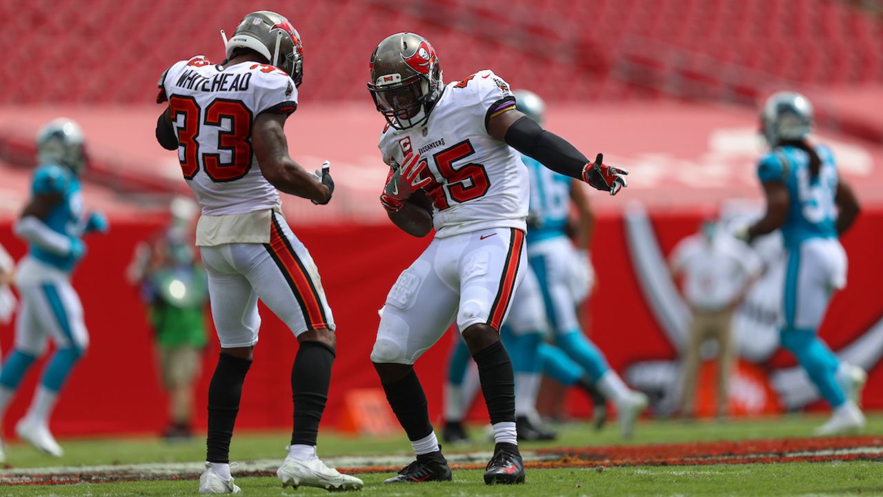 Tampa Bay Buccaneers inside linebacker Devin White (45) and free safety  Jordan Whitehead (33) t …