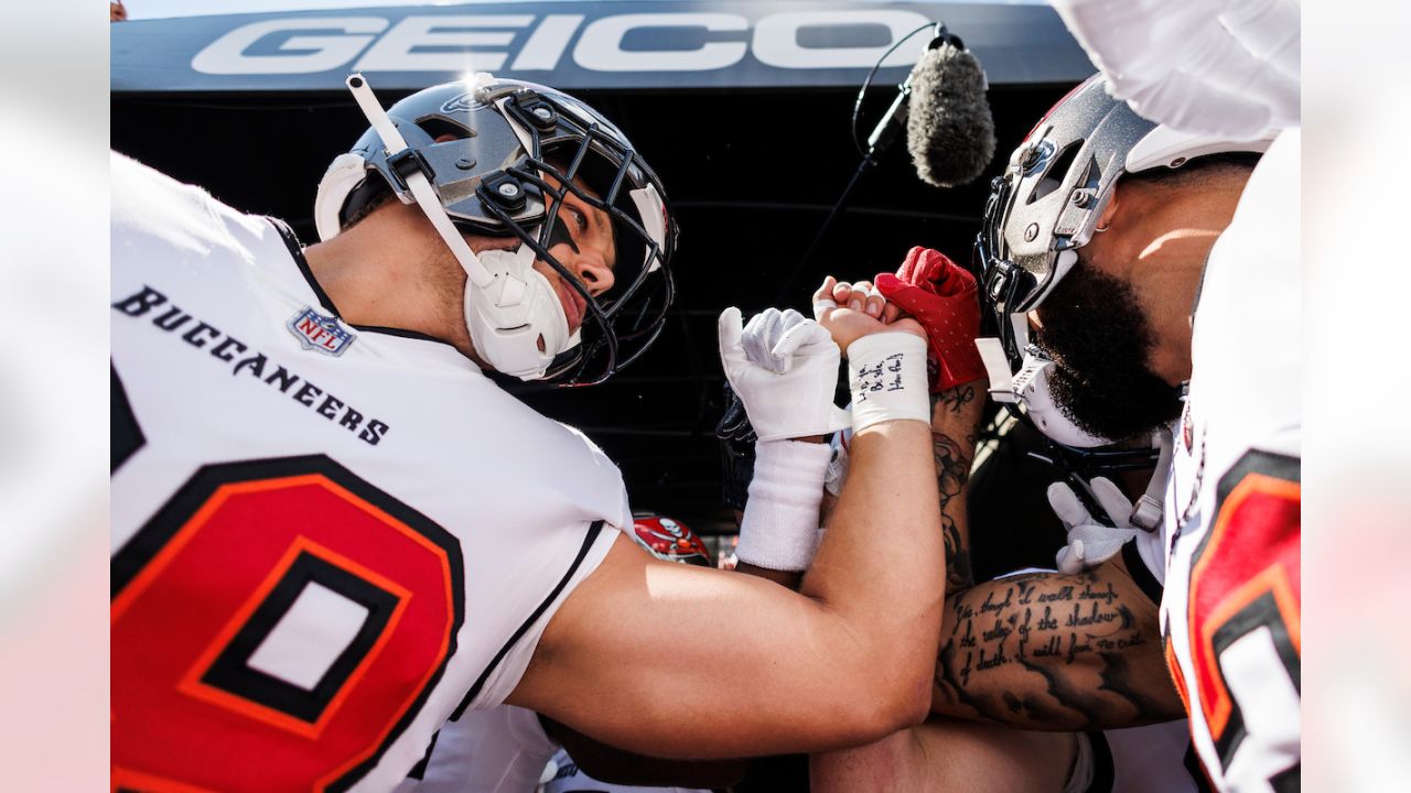 Tampa Bay Buccaneers tight end Cade Otton (88) runs after the