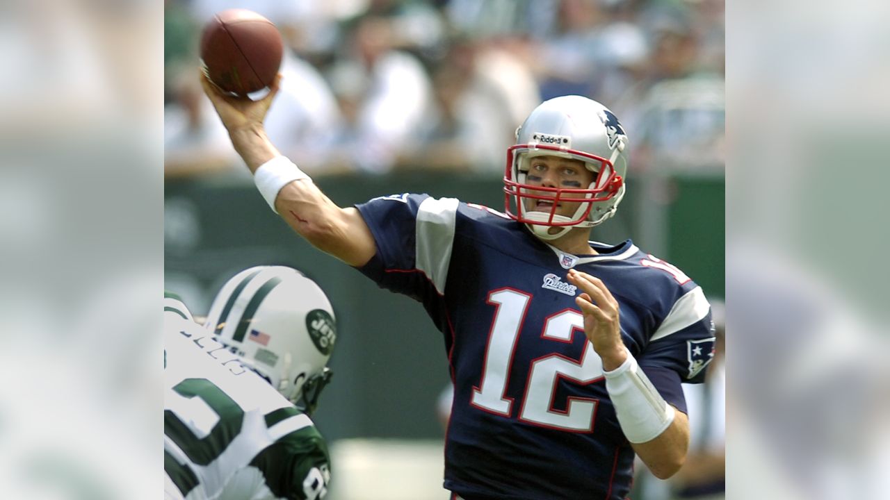 29 August 2012 - East Rutherford, New Jersey - New England Patriots  quarterback Tom Brady (12) looks on with his helmet off during the NFL  preseason game between the New England Patriots