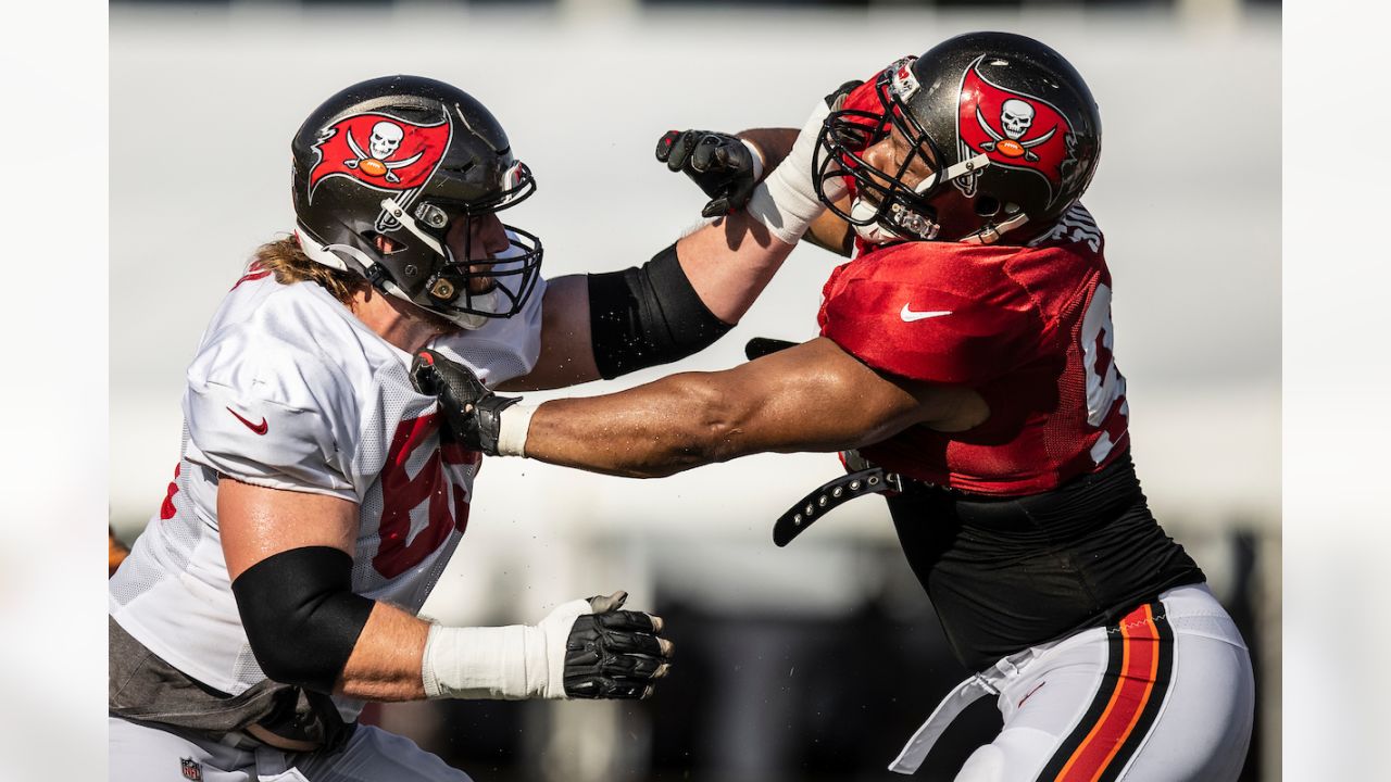 Tampa Bay Buccaneers offensive guard Alex Cappa (65) sits on the bench  during the first half of an NFL football game against the Dallas Cowboys,  Thursday, Sept. 9, 2021, in Tampa, Fla. (