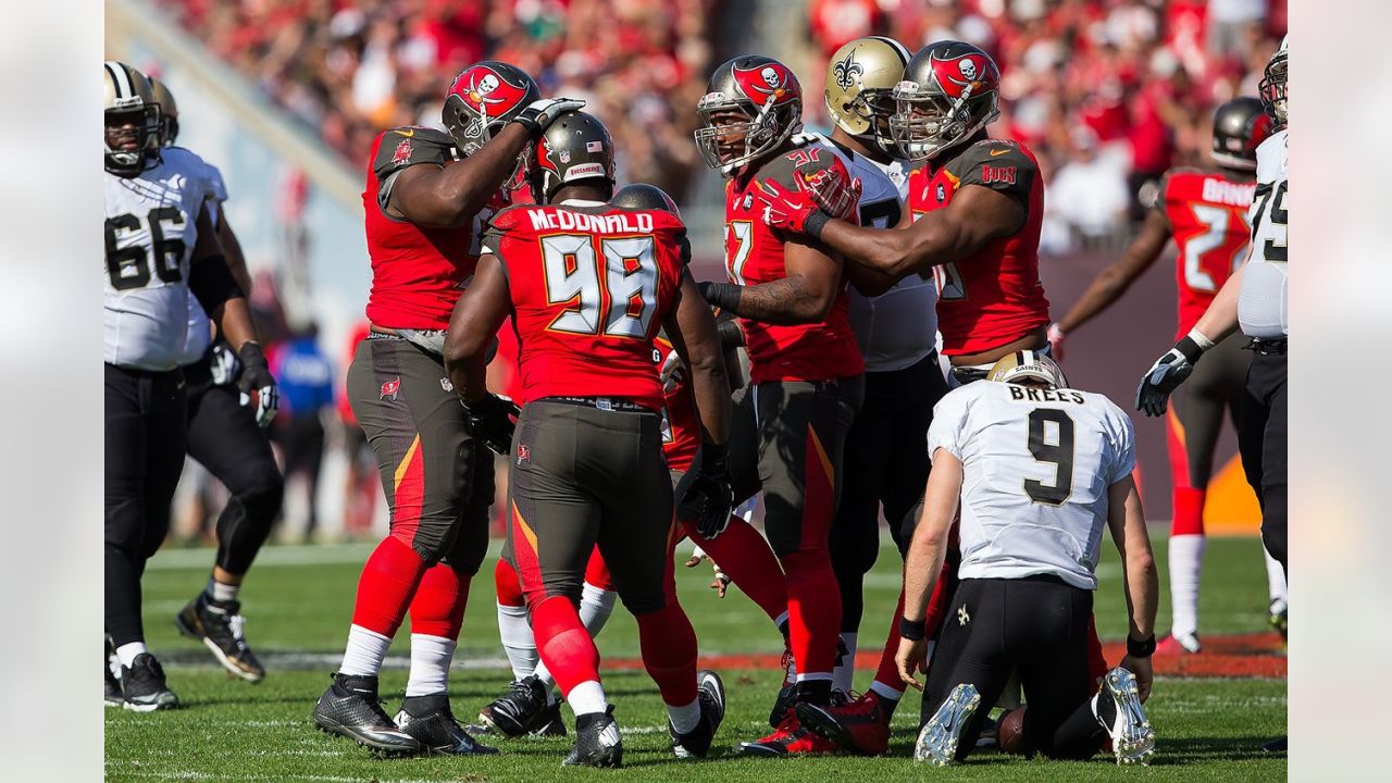 13 SEP 2009: Head Coach Raheem Morris of the Buccaneers in the red shirt  watches the instant replay during the game between the Dallas Cowboys and  the Tampa Bay Buccaneers at Raymond