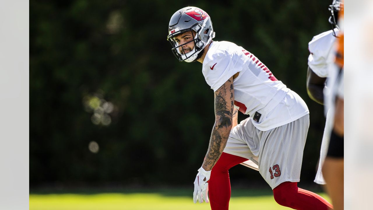 Tampa Bay Buccaneers defensive tackle Vita Vea (50) and linebacker Joe  Tryon-Shoyinka (9) runs sprints during an NFL football training camp  practice Thursday, Aug. 3, 2023, in Tampa, Fla. (AP Photo/Chris O'Meara