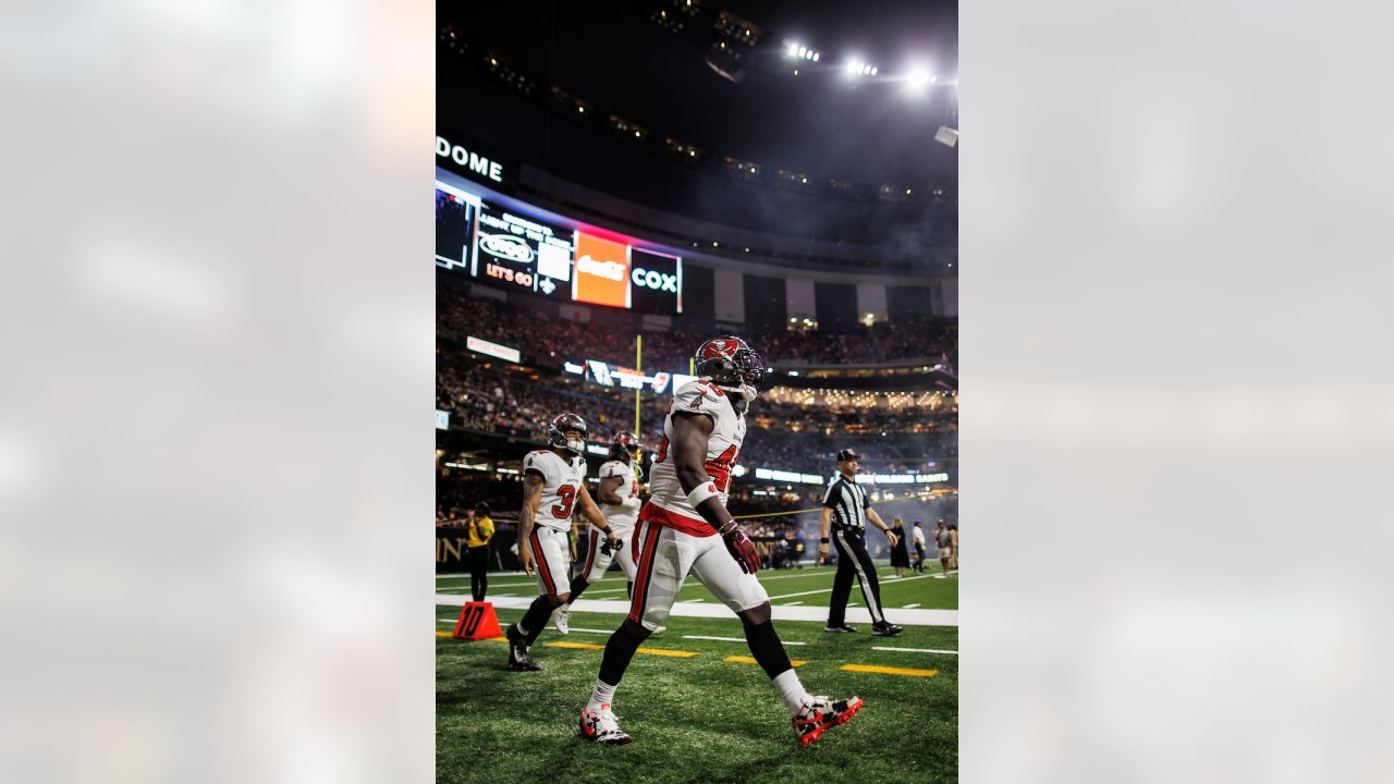 Saints Marshon Lattimore tackles Bucs Mike Evans before the ball is ev, saints