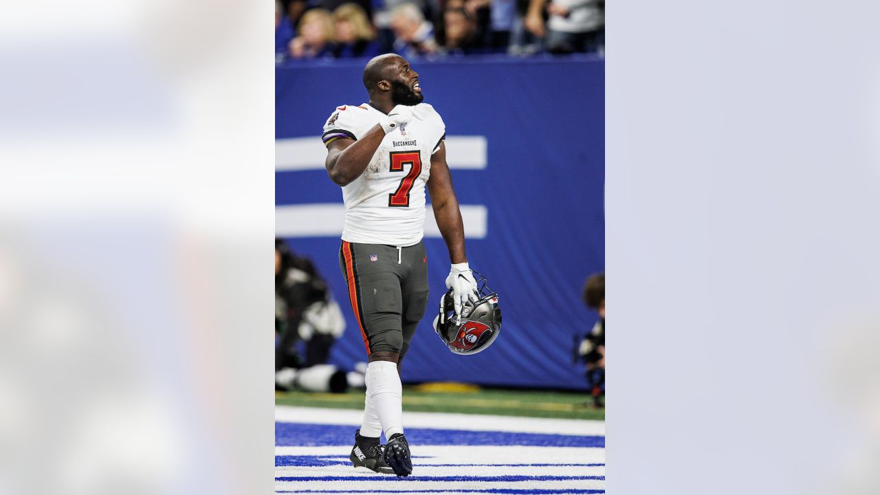 Tampa Bay Buccaneers running back Leonard Fournette (7) tries to put a juke  move on a defender during an NFL football game against the Baltimore  Ravens, Thursday, Oct. 27, 2022 in Tampa