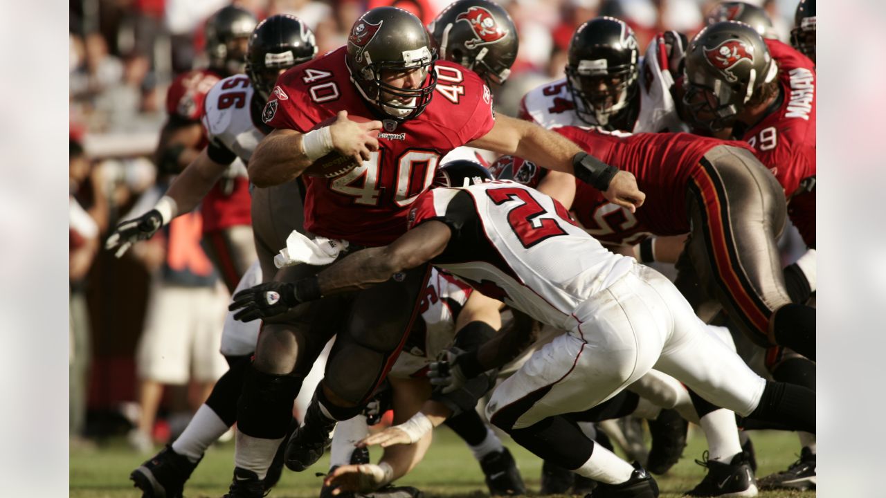 Tampa Bay Buccaneers' Mike Alstott points toward the stands after scoring a  touchdown on a 1-yard run against the Atlanta Falcons during the fourth  quarter Sunday, Dec. 5, 2004, at Raymond James