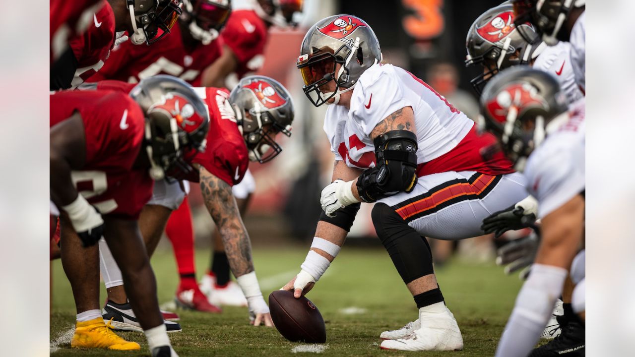 Tampa Bay Buccaneers offensive guard Alex Cappa (65) sits on the bench  during the first half of an NFL football game against the Dallas Cowboys,  Thursday, Sept. 9, 2021, in Tampa, Fla. (