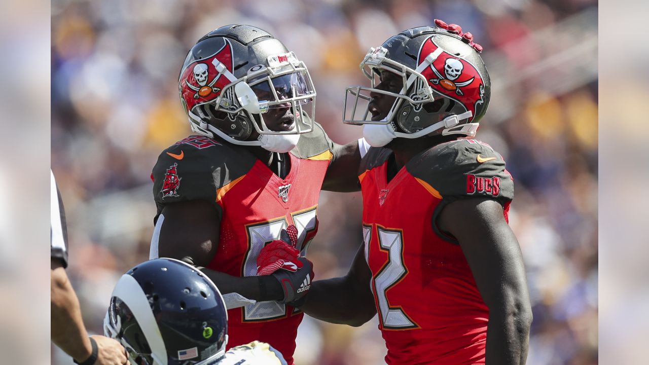 TAMPA, FL - OCTOBER 09: Tampa Bay Buccaneers Linebacker Carl Nassib (94)  rushes the passer during the regular season game between the Atlanta  Falcons and the Tampa Bay Buccaneers on October 09