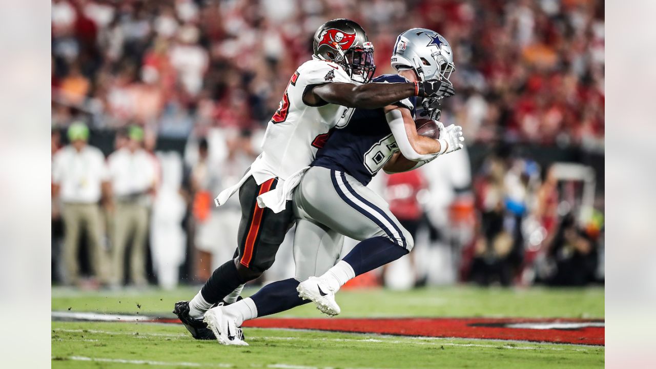 Why are Dallas Cowboys wearing red stripe on helmet vs. Broncos?