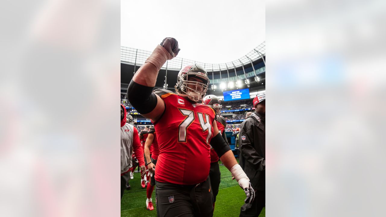 Tampa Bay Buccaneers offensive guard Alex Cappa (65) sits on the bench  during the first half of an NFL football game against the Dallas Cowboys,  Thursday, Sept. 9, 2021, in Tampa, Fla. (