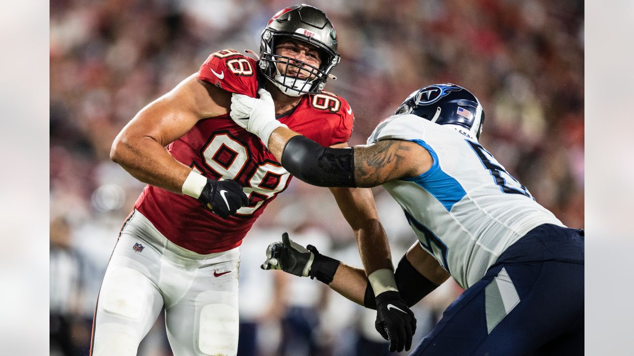 Tampa Bay Buccaneers linebacker Joe Tryon-Shoyinka (9) stretches out prior  to an NFL football game against the New England Patriots, Sunday, Oct. 3,  2021, in Foxborough, Mass. (AP Photo/Greg M. Cooper Stock