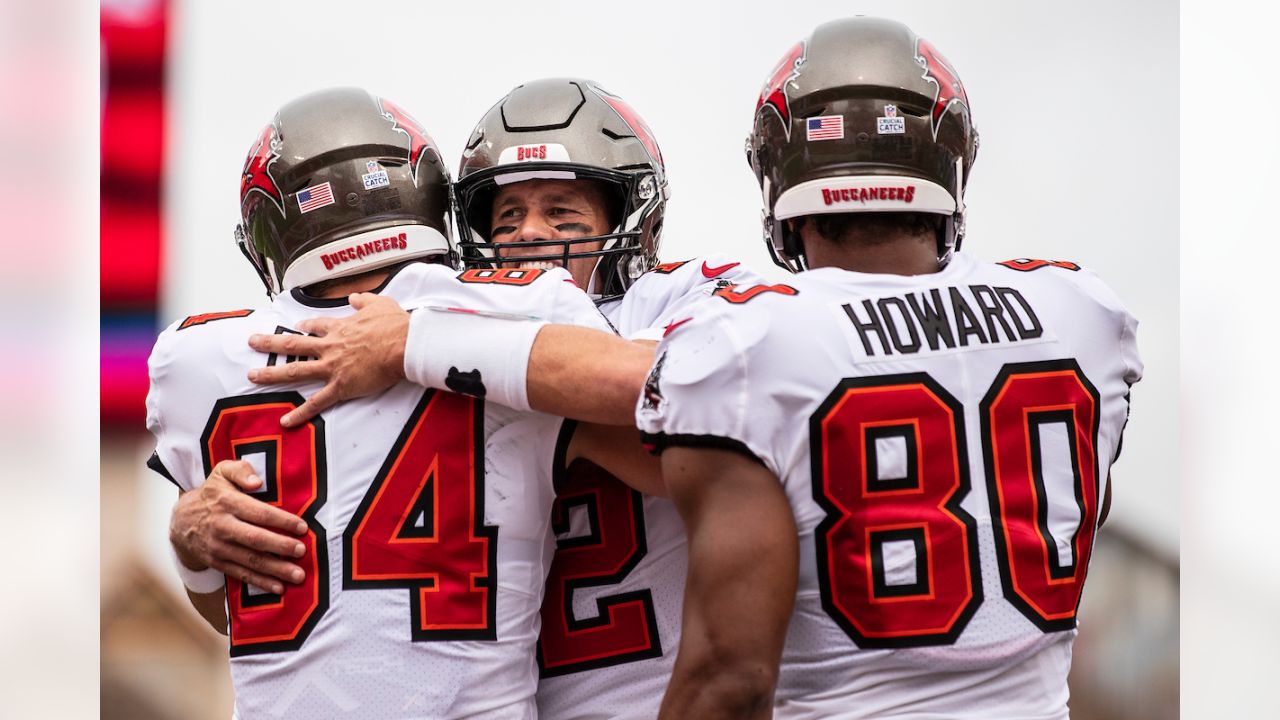 Tampa Bay Buccaneers quarterback Tom Brady (12) talks with tight