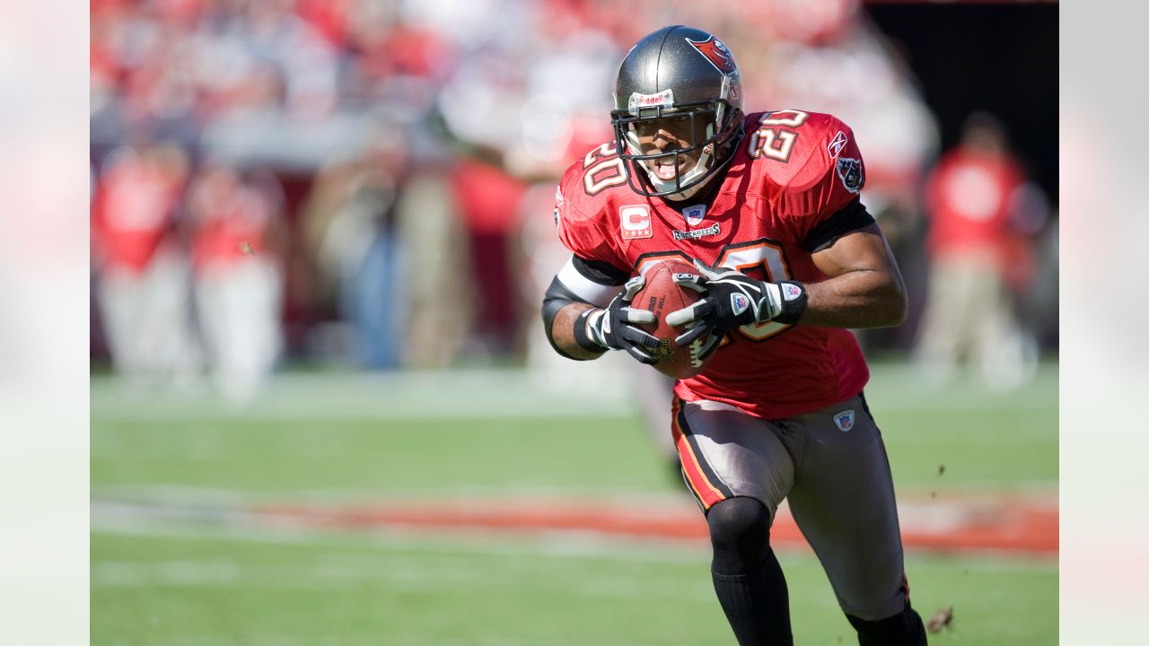 Tampa Bay Buccaneers cornerback Ronde Barber (20) strips the ball