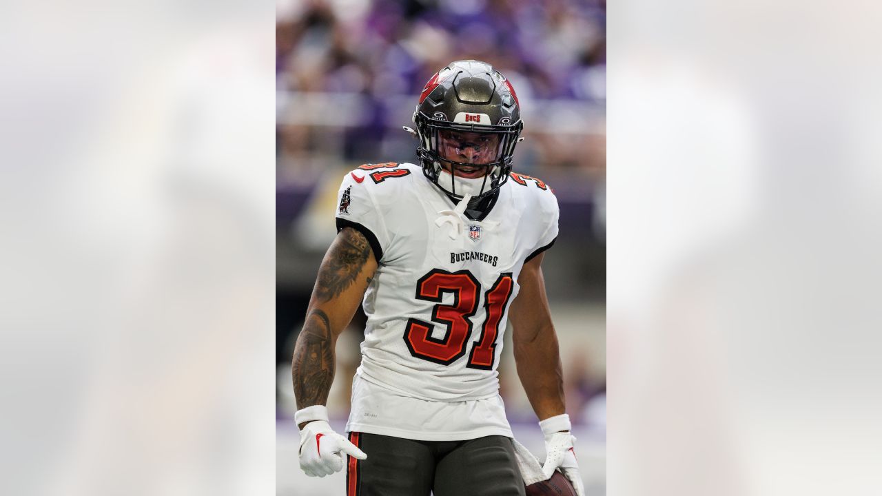 Tampa Bay Buccaneers safety Ryan Neal (23) in action during the first half  of an NFL football game against the Minnesota Vikings, Sunday, Sept. 9,  2023 in Minneapolis. (AP Photo/Stacy Bengs Stock