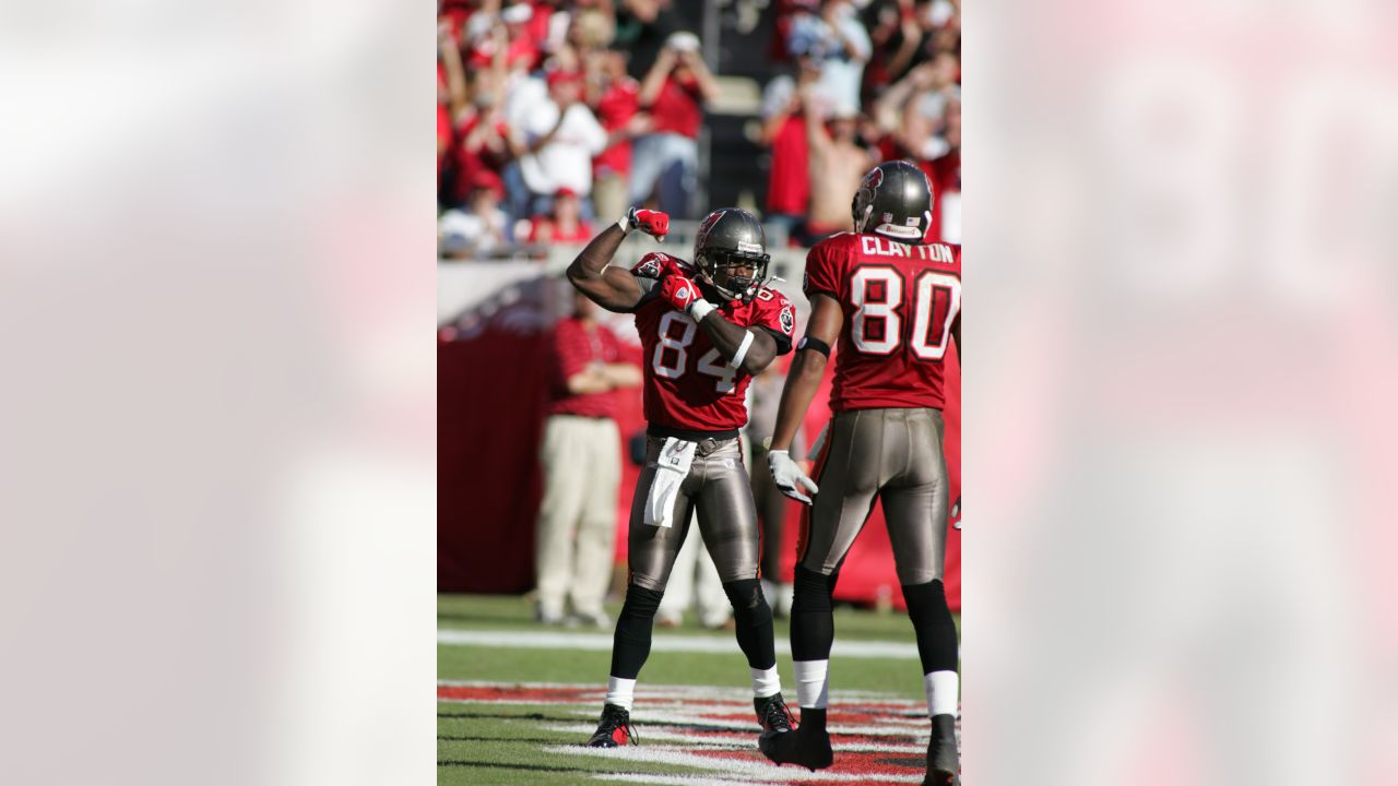 Tampa Bay Buccaneers wide receiver Chris Godwin (12) is stopped by  Washington Redskins defensive back Danny Johnson (41) during the first half  of an NFL football game Sunday, Nov. 11, 2018, in