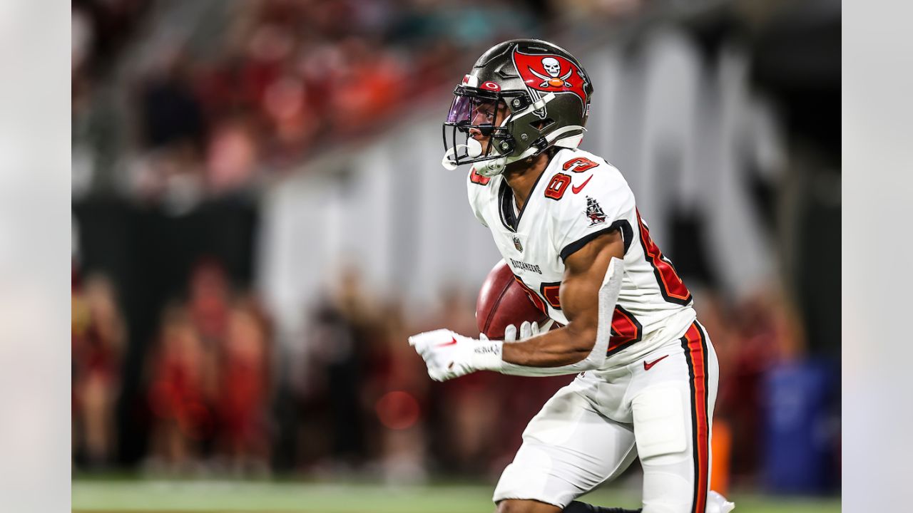 Miami Dolphins running back Salvon Ahmed (26) and running back Myles Gaskin  (37) watch from the sideline during the first half of a NFL preseason  football game Las Vegas Raiders, Saturday, Aug.