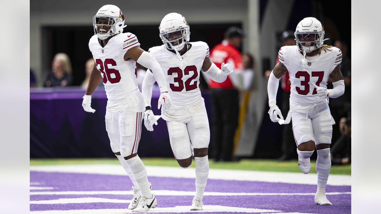 Arizona Cardinals defensive JuJu Hughes (36), Kris Boyd (29) and