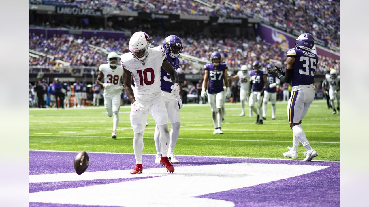 Arizona Cardinals wide receiver Davion Davis (10) runs down the field  during the first half of an NFL preseason football game against the  Minnesota Vikings, Saturday, Aug. 26, 2023, in Minneapolis. (AP