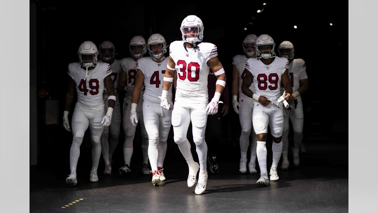 Arizona Cardinals wide receiver Davion Davis (10) runs down the field  during the first half of an NFL preseason football game against the  Minnesota Vikings, Saturday, Aug. 26, 2023, in Minneapolis. (AP