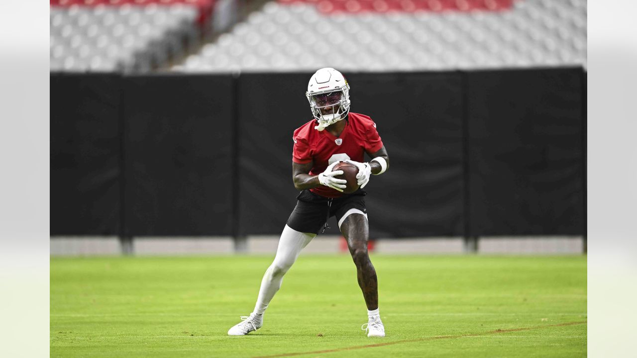 Arizona Cardinals quarterback Colt McCoy puts his helmet on during NFL  football training camp practice at State Farm Stadium Friday, July 28,  2023, in Glendale, Ariz. (AP Photo/Ross D. Franklin Stock Photo 