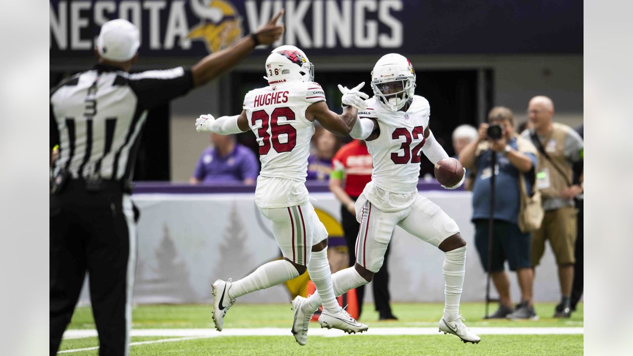 Arizona Cardinals defensive JuJu Hughes (36), Kris Boyd (29) and