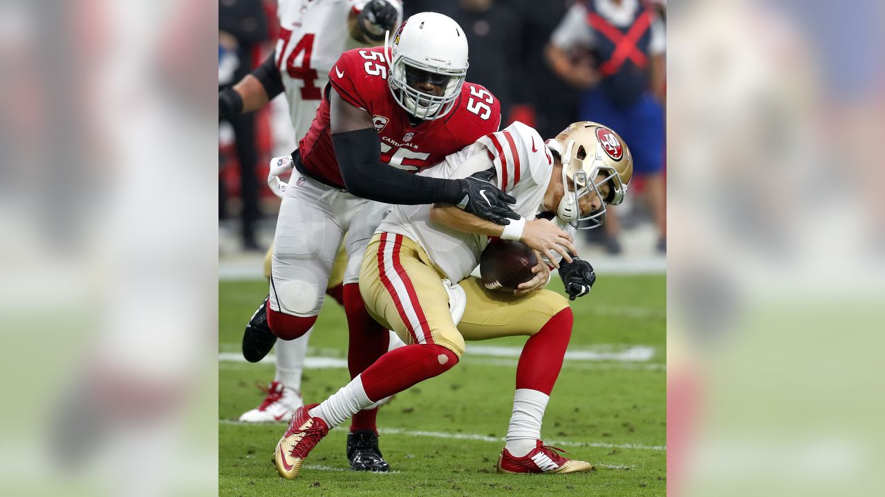 Arizona Cardinals defensive end Chandler Jones (55) sacks San Francisco 49ers quarterback C.J. Beathard (3) during the first half of an NFL football game, Sunday, Oct. 28, 2018, in Glendale, Ariz.