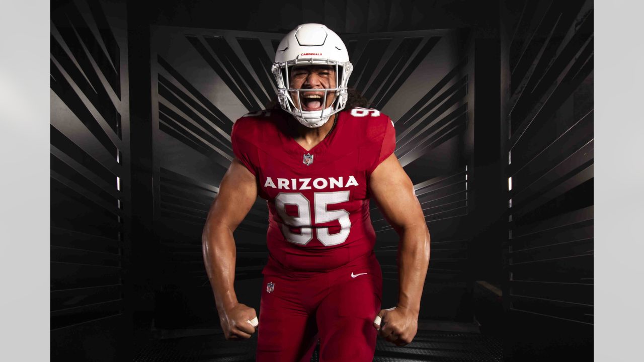 Arizona Cardinals defensive tackle Leki Fotu (95) looks up at a