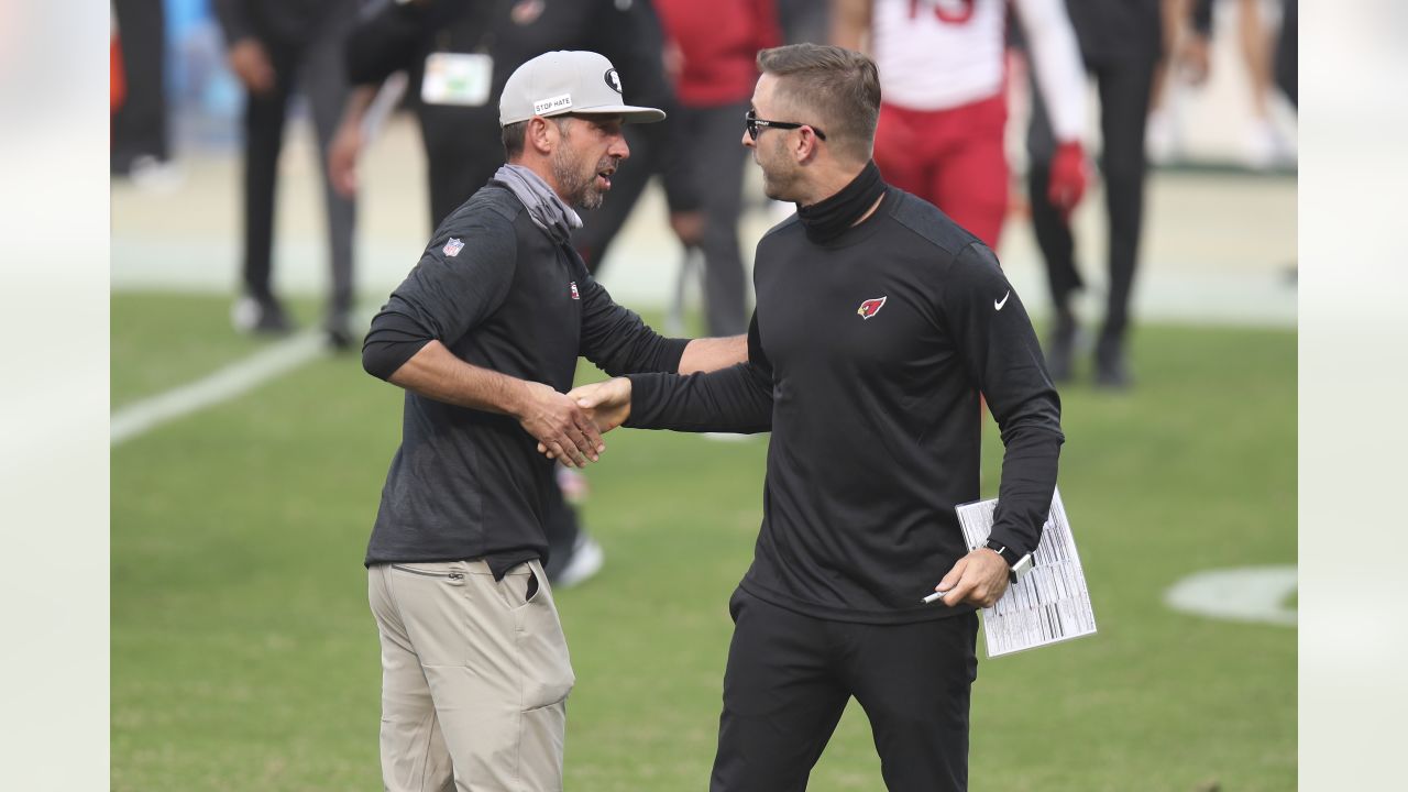 Arizona Cardinals head coach Kliff Kingsbury talks center Billy Price (53)  before an NFL football game against the San Francisco 49ers, Monday, Nov. 21,  2022, in Mexico City. (AP Photo/Fernando Llano Stock