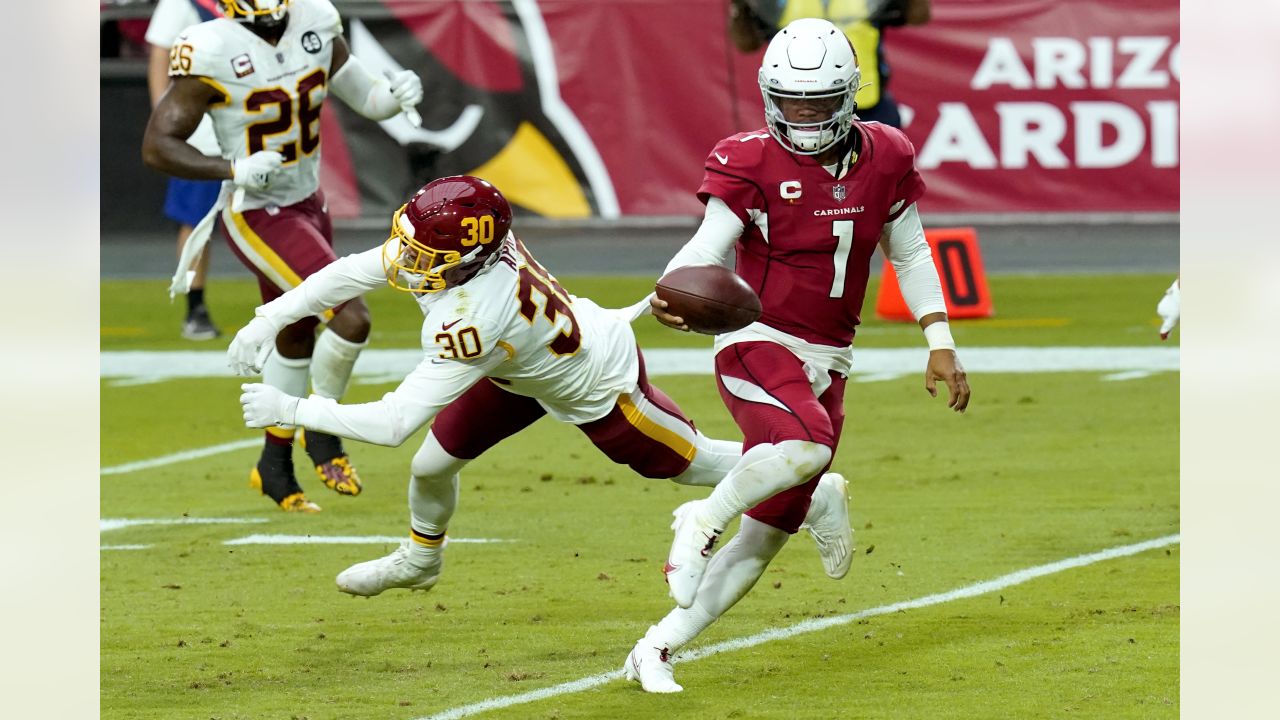 Arizona Cardinals quarterback Kyler Murray is tackled by