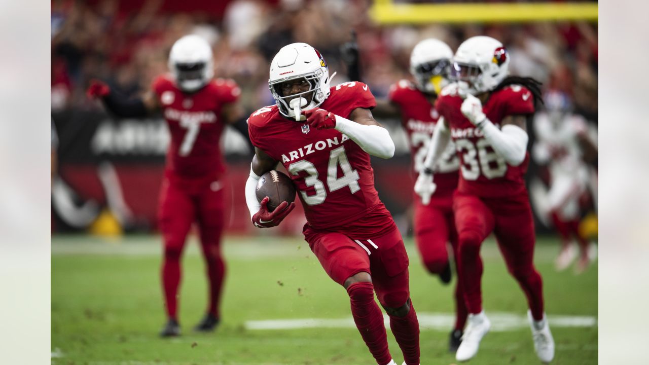 Cardinals' Budda Baker leaves field on stretcher after helmet-to