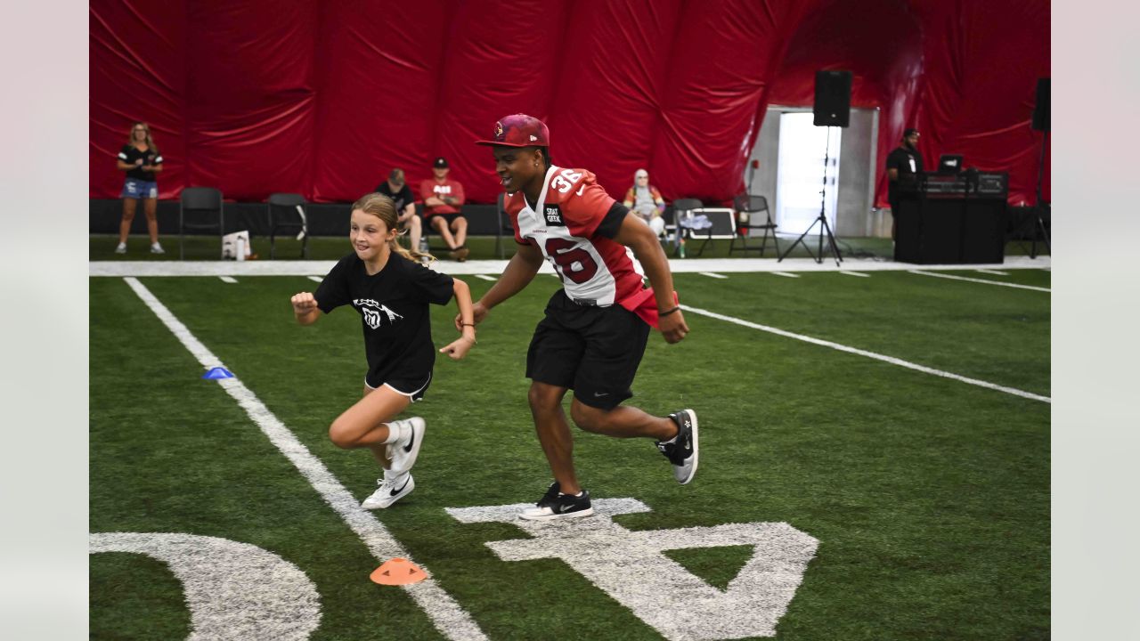 Photos: Arizona Cardinals host Mikey's League youth football camp