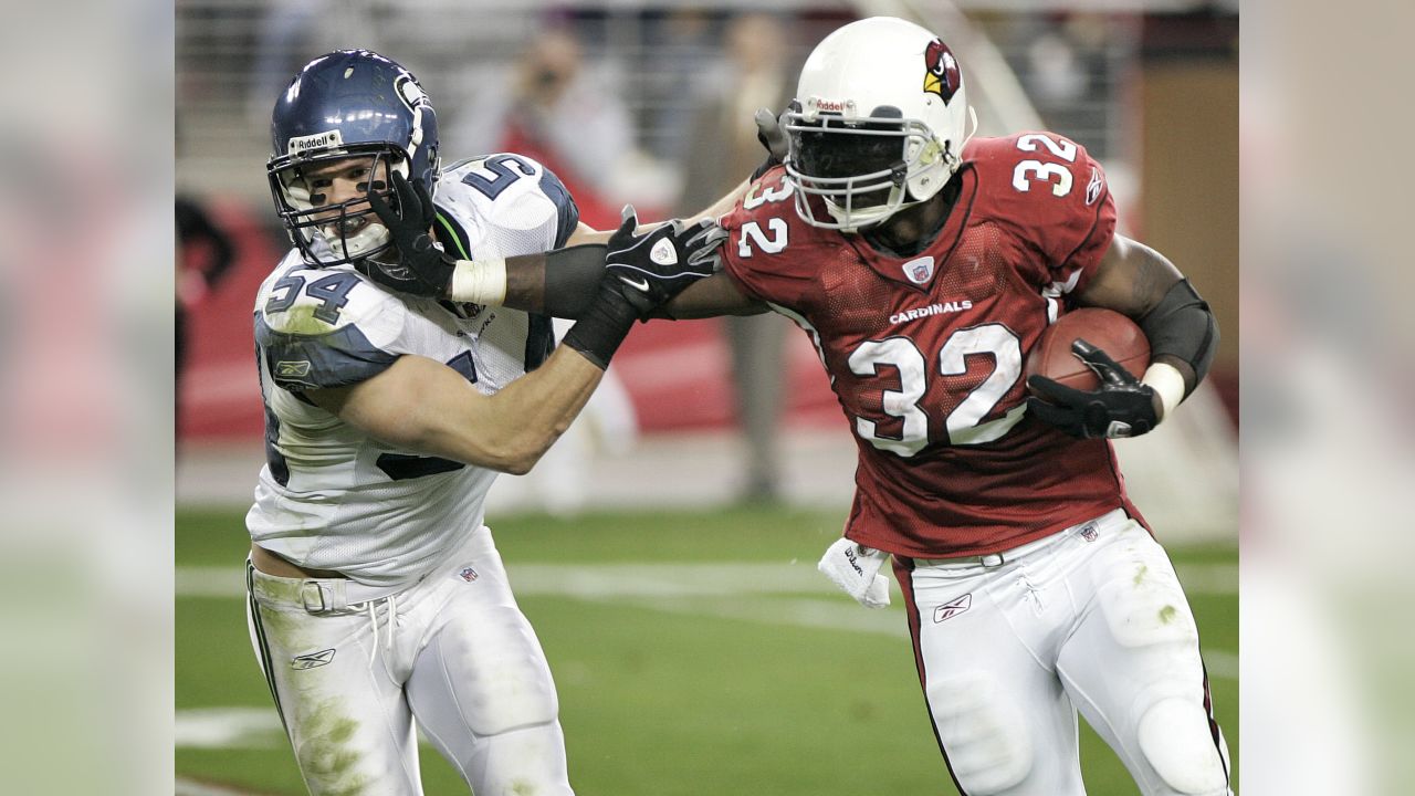 Arizona Cardinals running back Edgerrin James (32) gives a stiff